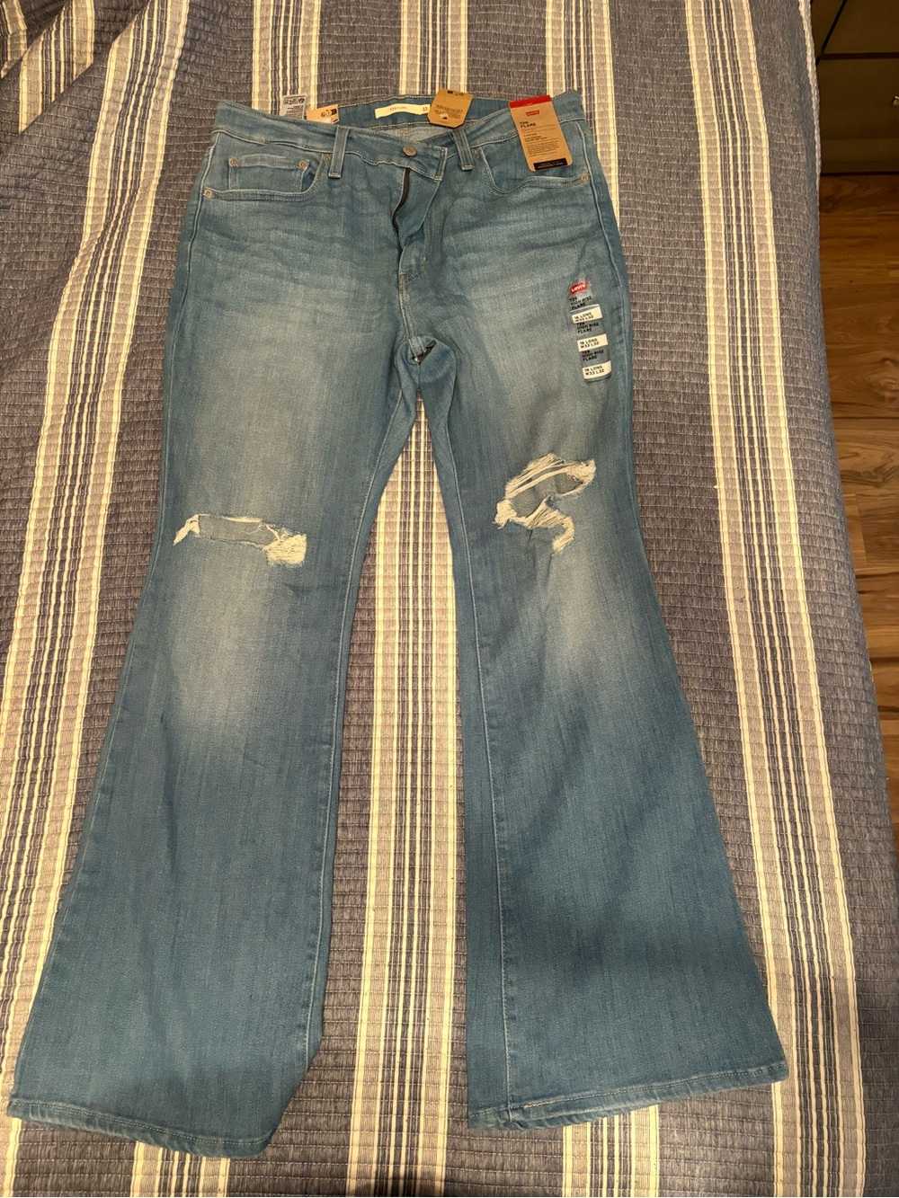 Levi's Light Blue Distressed Flare Jeans